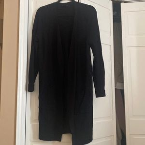 Mid thigh black cardigan with side slits